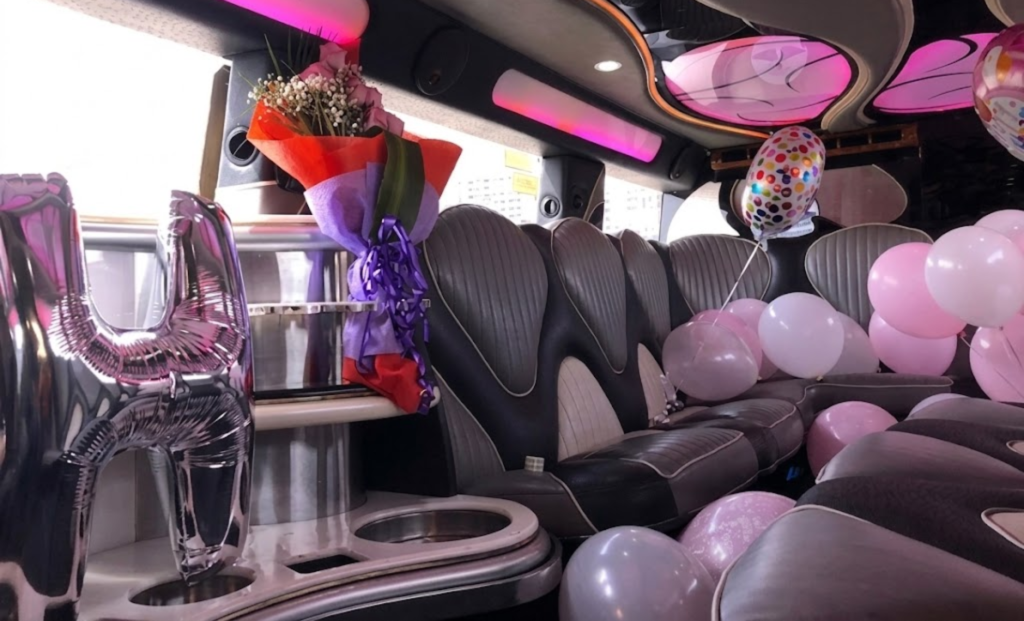 Decorated party bus cabin set up for a prom night celebration